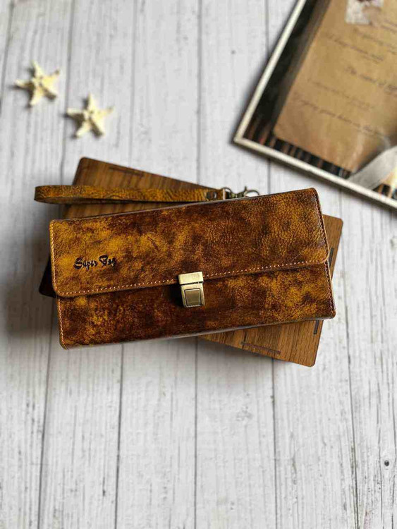 خرید کیف پول دستی چرم گاوی دسترنگ طرح دار