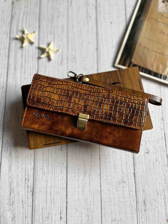 خرید کیف پول دستی چرم گاوی دسترنگ طرح دار