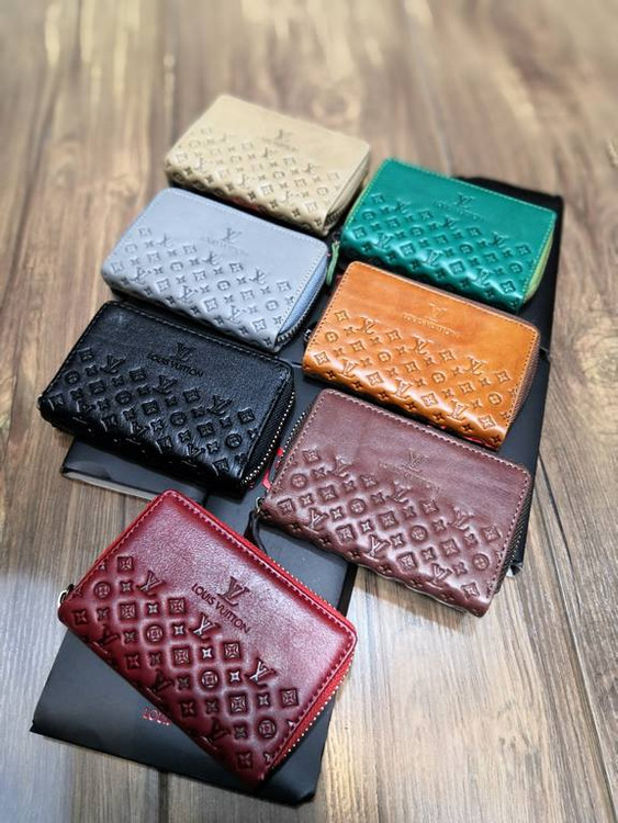 خرید جاکارتی چرم گاوی طبیعی دور زیپ طرح دار ال وی