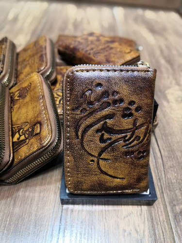 خرید جاکارتی چرم گاوی طبیعی دور زیپ دسترنگ طرح دار