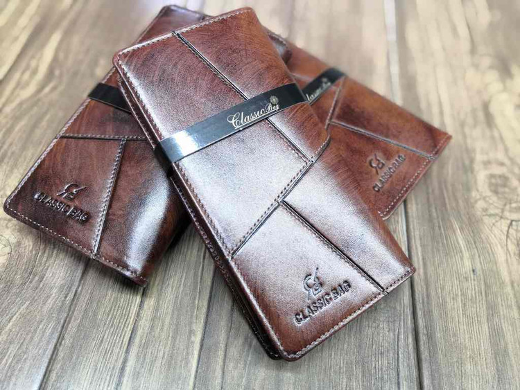 خرید کیف پول کتی چرم گاوی طبیعی دسترنگ خطی برند ck